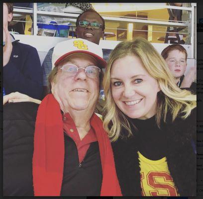 Kenneth with daughter at a game.