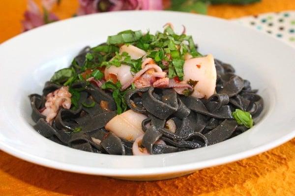 Homemade squid Ink tagliatelle with spicy calamari sauce