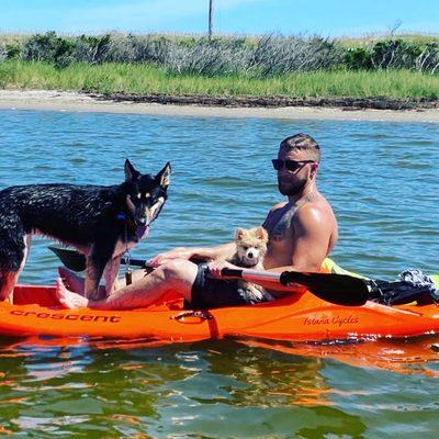 Customer enjoying his kayak rental and his dogs. :)