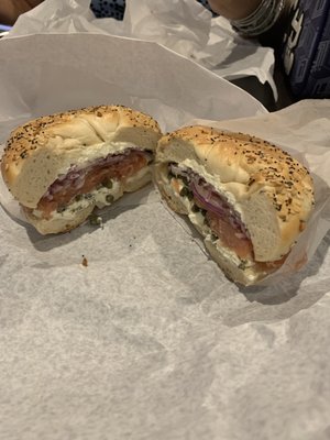 Everything bagel with lox, cream cheese, onion and capers.