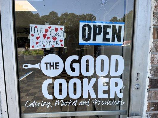 Front door. Love the kid sign... cute story...Chef's son named the place