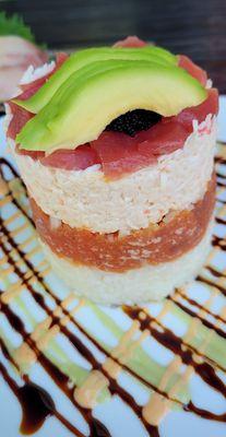 The stack of spicy tuna, crab, tuna ahi.