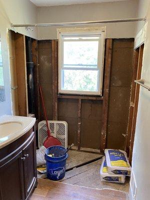 After removal of drywall, surround and bathtub.