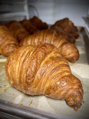 Artisan croissants made by our in-house bakery