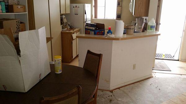 The owner of this condo had not been able to enter her kitchen or use the refrigerator there in over a year!