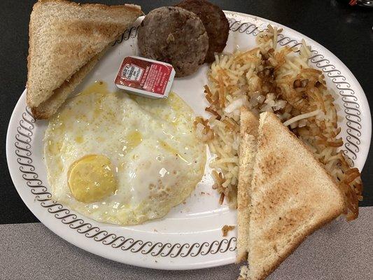 Two Eggs, Hash Browns, Sausage, and White Toast