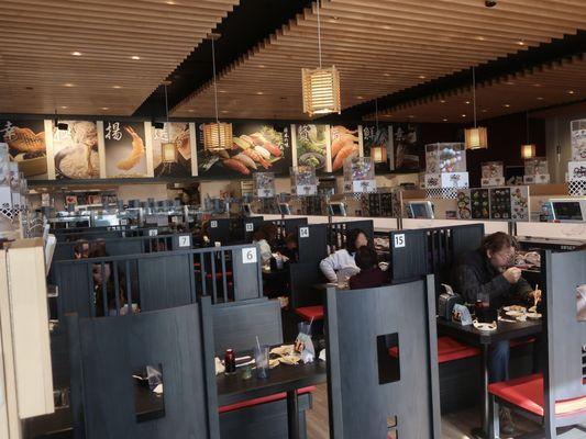 A view of their space and the conveyor belt snakes by every table.