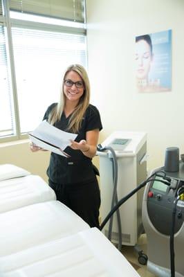 Technician in a treatment room at Simplicity.