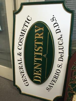 Refurbishing original sign made by customer's father.