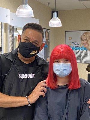 Beautiful pink hair color service performed  By Orlando Puente at  Supercuts in boca Raton State rd 7  Florida