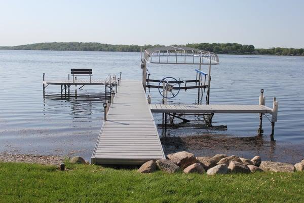 New Shoremaster RS4 Dock w vinyl deck and Shoremaster DVS vertical boat lift and canopy.