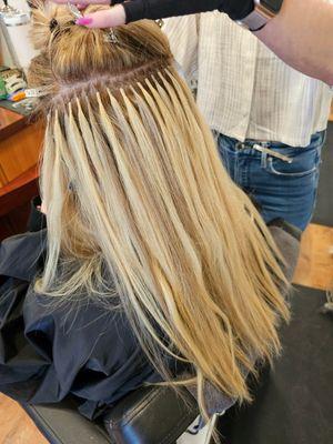 We now offer all different types of hair extensions.  Call us today (847)853-0022