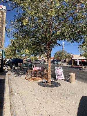 Outside seating and benches next door