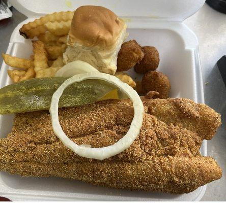 2 pieces catfish dinner, fries, hush puppies, and roll (Pickles and onions on request)