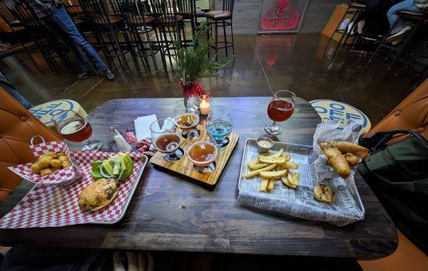 Cheeseburger, beer flight, fish and chips