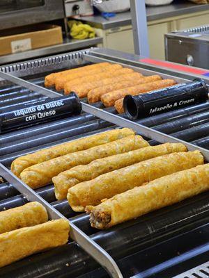 Close-up of the different taquitos always hot and fresh.