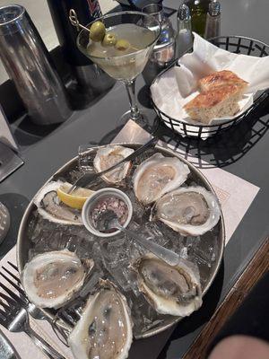 Oysters  and a dirty martini   And their bread and butter is amazing