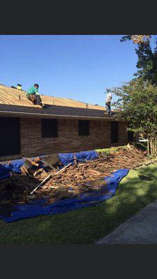 Removal of wood shake and installation of new decking before installing new roofing system