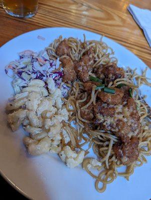 Inedible - cold & dry. Rubbery chicken with crunchy noodles and old mac salad.