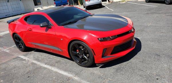 Red Chevrolet Camero, Hood, Roof, and Wing are all customized with 3M Carbon Fiber vinyl wrap.