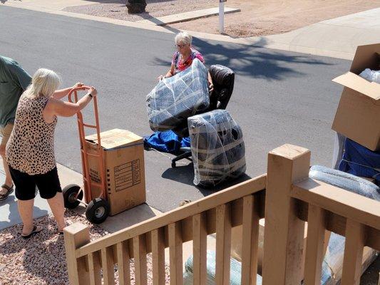 This is my 55+ community neighbors bringing in my furniture in for me while I worked.