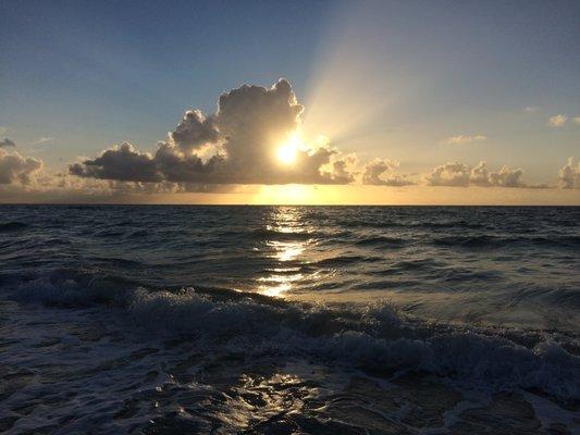 Sunrise from the beach, steps from our room