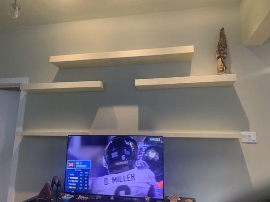 Custom built, free floating shelves