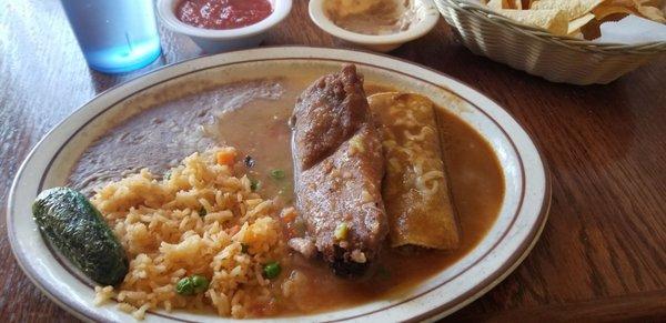 Cheese chile relleno with ground beef enchilada smothered in green chili sauce