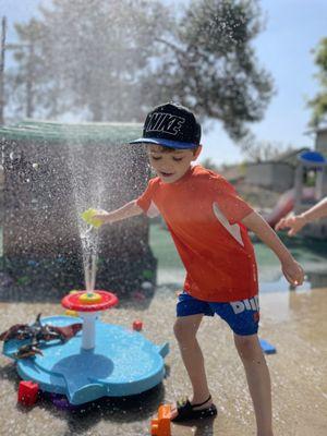 My son playing on splash day