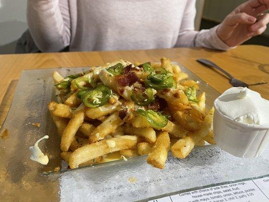 Fries with melted gouda, crisp bacon bits, agave and jalapeno