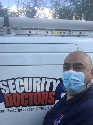 Ricardo on the job with his PPE.  Ricardo is Navy Veteran and has been in the home security/alarm business for more than 15 years.