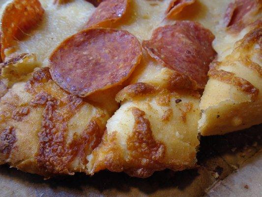 Pepperoni fries, close-up.