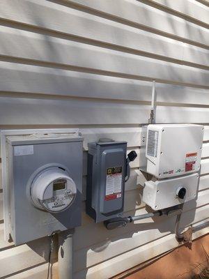 A view of the new smart meter, and the on/off boxes.