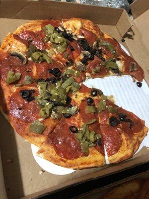 Pepperoni, green chili black olives and mushrooms