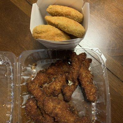 Burnt chicken tenders and perfectly cooked jalapeño poppers.