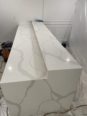 Custom Quartz countertops with waterfalls