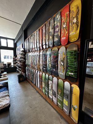 over 25 different deck brands including Anti Hero, Bacon, Baker, Blood Wizard, Fixer, Frog, Girl, Habitat, Krooked, Polar, Real, Welcome...