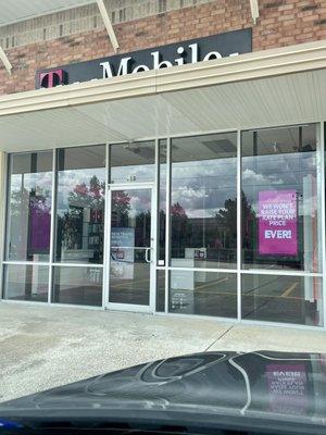 A closed store at 2:53 p.m. on a Saturday.