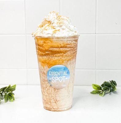 Salted Caramel Macchiato Protein shake with caramel drizzle and whipped cream