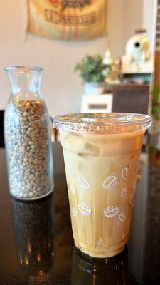 Iced latte with almond milk, hazelnut and caramel drizzle