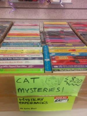 A box of cat mysteries for $20.