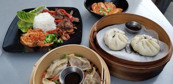 We had the pork and cabbage dumplings, korean bbq chicken pan fried dumplings, Korean BBQ platter, and hoisin pork buns...all.just ok.