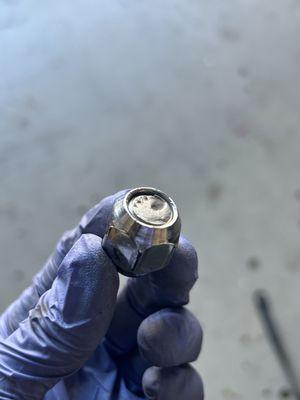 Other half of stud stuck inside lug nut