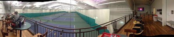 Panorama of the indoor tennis courts at the HealthPlex