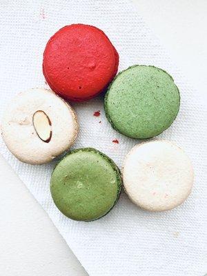 Strawberry-red, Pistachio-green, Vanilla-off white, & Almond-off white with the Almond on top.