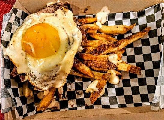 Steak Frites: Flank Steak, Fries, Sunny Side Egg, IPA-ioli. $22