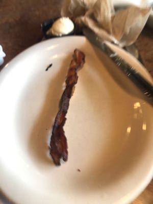 The bacon is burnt and not even crispy! Yuck!