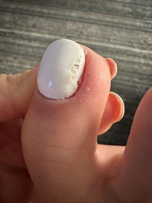 I took off the edge that was lifting and here is the uneven polish underneath.