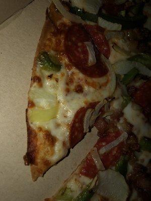 Thin crust bacon onions pepperoni green peppers