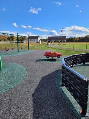 Swings, picnic pavilion, and field